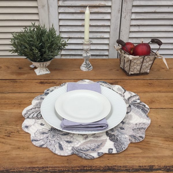aurelia-quilted-round-place-mat-tan-cloth-napkin-round-place-mat-gray-cloth-napkin-farmhouse-basket-candle-holder