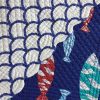 aqua-blue-red-fish-pattern-on-navy-and waves-quilted-reversible-dining-collection-swatches