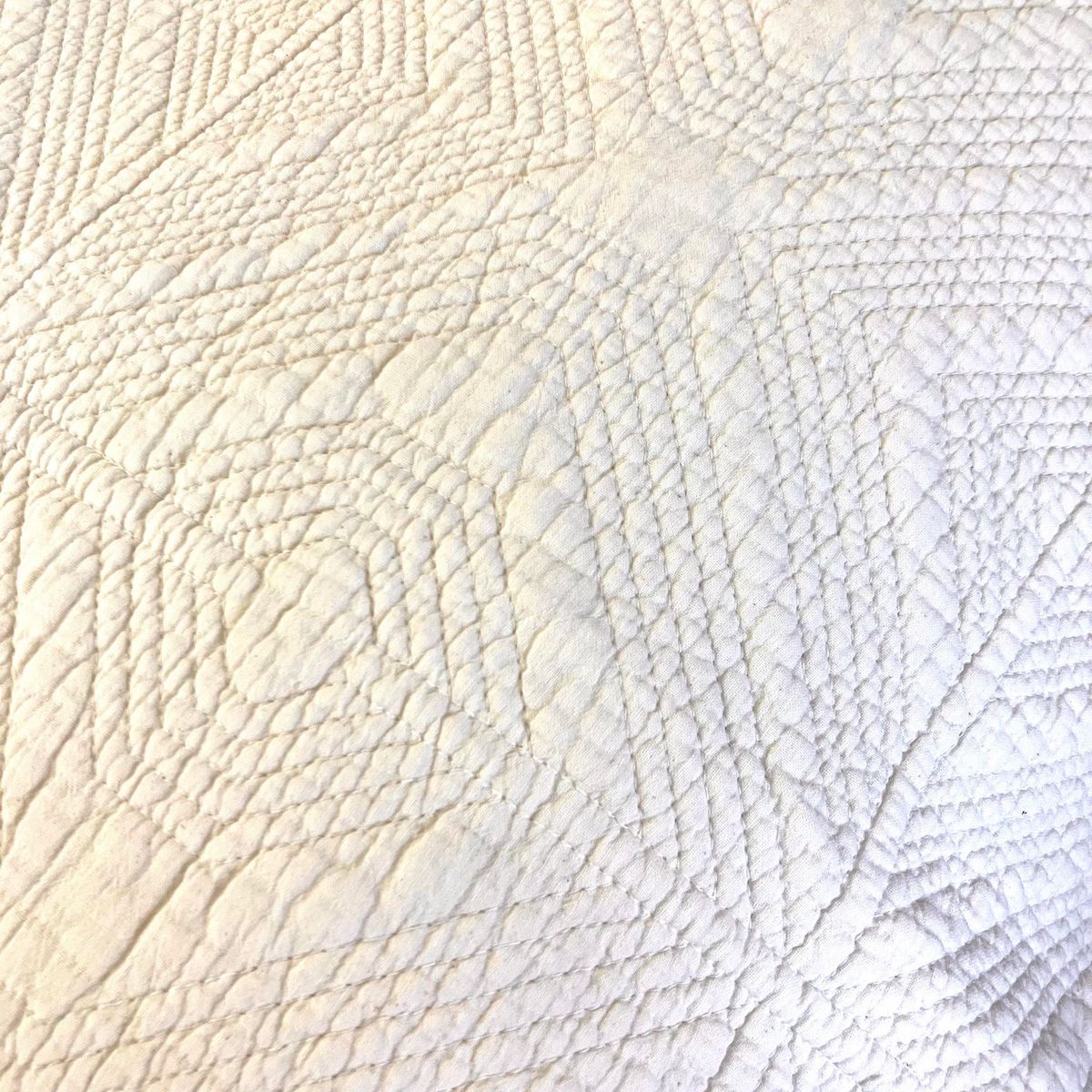 Beautiful stitching on stonewashed natural quilt