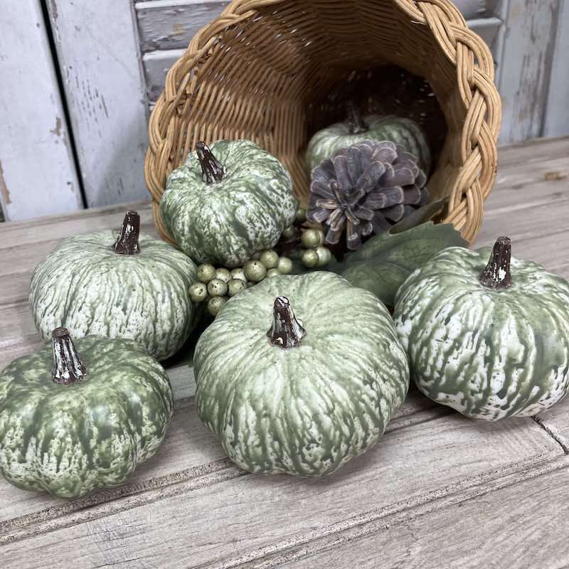 Harvest Mini Pumpkins Decorative Set displayed in a basket cornucopia