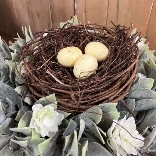 Twiggy Birds Nest with Eggs with Aylesford Creamy Flowers wiht Greenery Candle Ring Twiggy Birds Nest with Eggs with Aylesford Creamy Flowers wiht Greenery Candle Ring