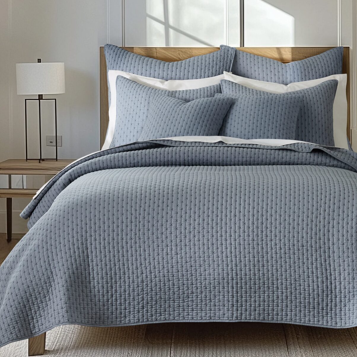 Cross Stitch Solid Chambray Blue Quilt Set includes a quilt and 2 shams